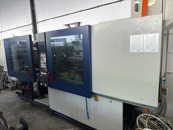 Máquina de moldagem por injeção Ferromatik Milacron K110D-S/2F