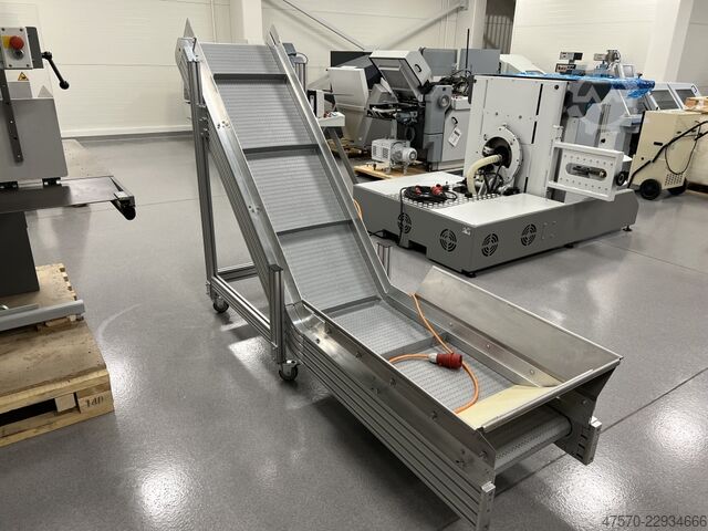 Κοπτικό μηχάνημα (die cutter) Conveyor belt for waste removal from guillotine, three-knife trimmer
