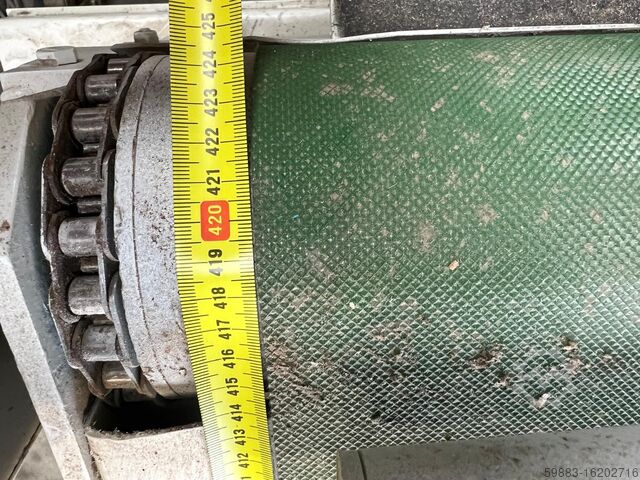 Cinta transportadora de retorno al operador Hess