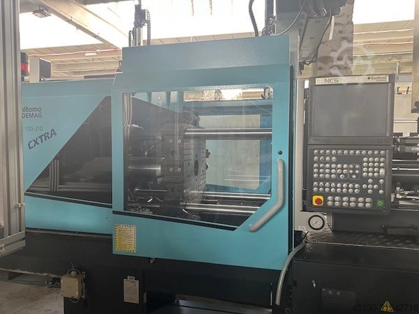 Máquina de moldagem por injeção Sumitomo Demag Systec 100/420-310