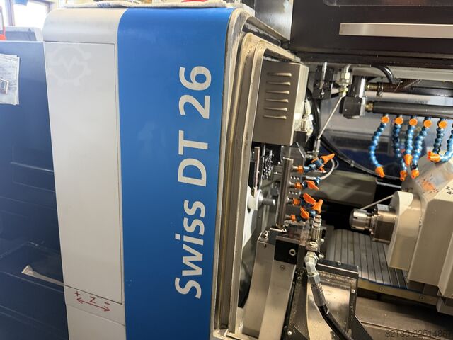 Torno automático de cabezal móvil Tornos Swiss DT 26