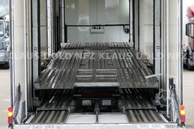 Auto met oplegger KÄSSBOHRER SP 9-16 geschlossener Autotransporter