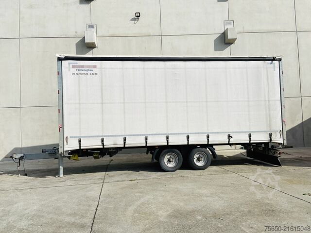 Otwarta przyczepa z plandeką Möslein TP 11 Schwebheim  Tandem- Schiebeplanenanhänger zum Durchladen