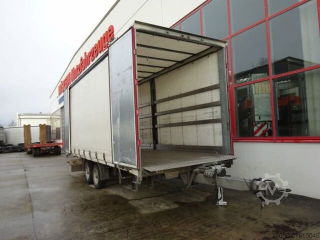 Otwarta przyczepa z plandeką Möslein TP 11 Schwebheim  Tandem- Schiebeplanenanhänger zum Durchladen