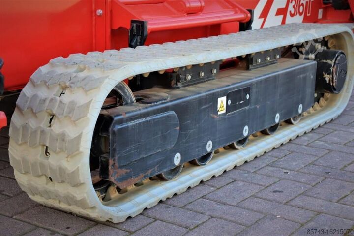 Scharnierende telescopische hoogwerker Teupen Leo 36t 230 V Electric Motor + Diesel, Rubber Trac