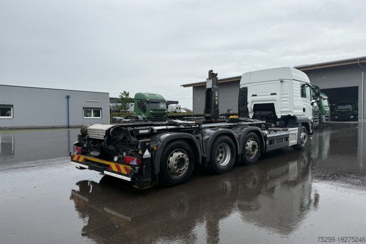 Haakarm vrachtwagen MAN TGS 34.420 8×2 M-TEC Silosteller / Swiss-Vehicle