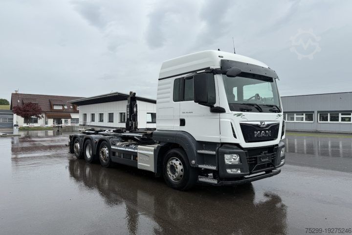 Haakarm vrachtwagen MAN TGS 34.420 8×2 M-TEC Silosteller / Swiss-Vehicle