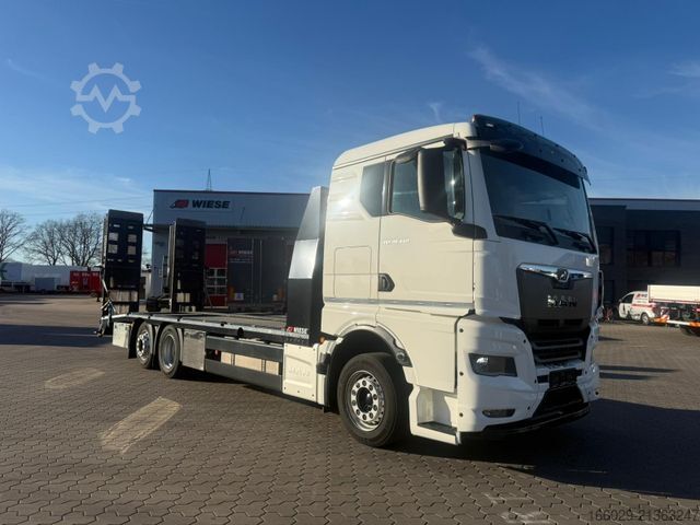 Vrachtauto met open laadbak MAN TGX 26.440 6x2-4 LL Maschinen Transporter