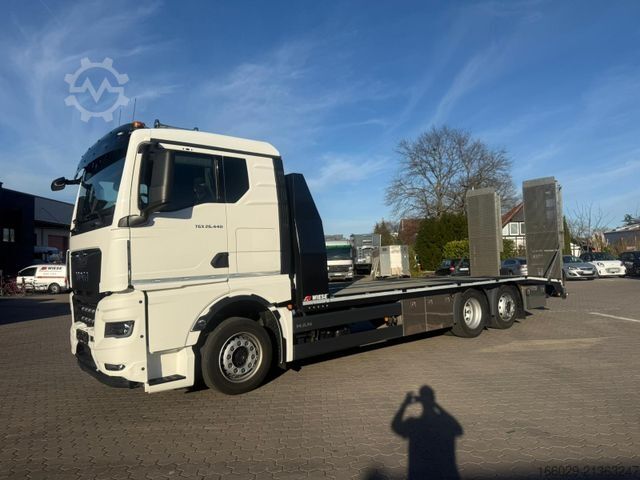 Vrachtauto met open laadbak MAN TGX 26.440 6x2-4 LL Maschinen Transporter