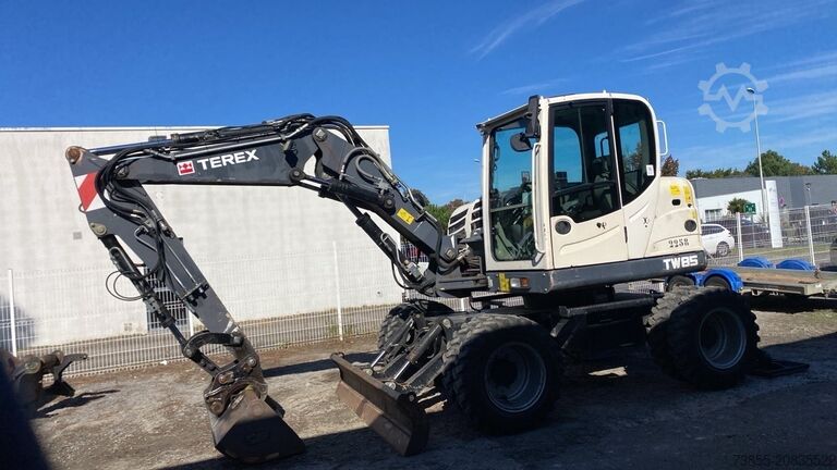 Wheeled Excavator Terex Tw 85 Schaeff with 3 buckets and forks