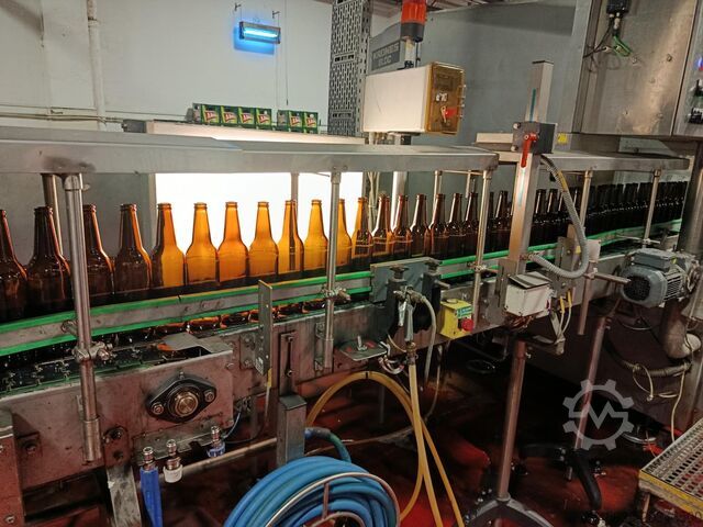 Nalewarka do szklanych butelek, 22 000 butelek na godzinę Krones 066-103/KK11-M