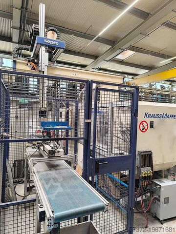 Máquina de moldagem por injecção KraussMaffei KM 50/KM 125