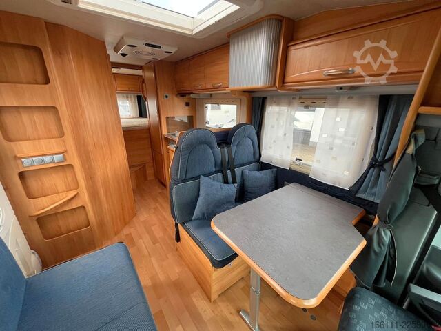 Autorulotă semi-integrată ADRIA 670 SP - Festbett - Garage - 2 x Klima