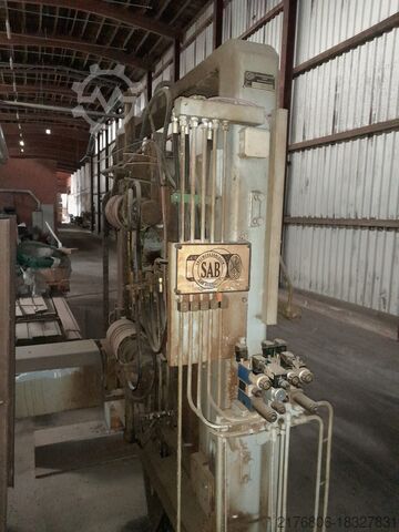 DISPOSITIF DE TOURNAGE DES BÛCHES / dispositif de retournement double.