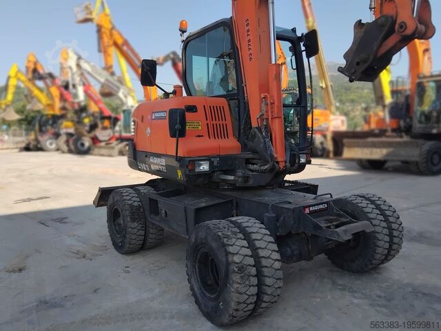 Excavadora sobre neumáticos Doosan DX55W