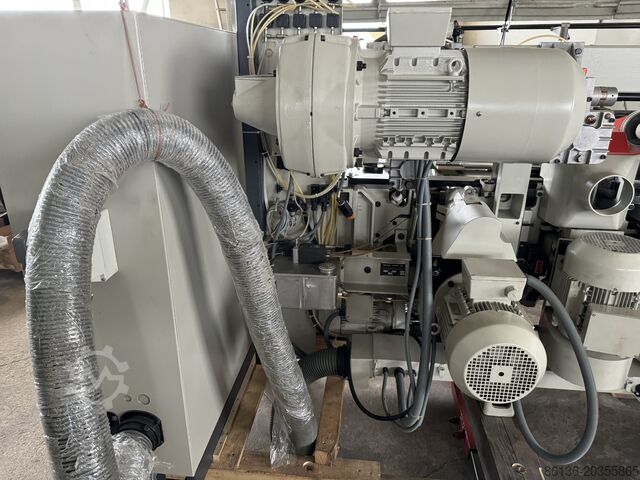 Planer and moulder WEINIG Hydromat 23 Lamelliermaschine