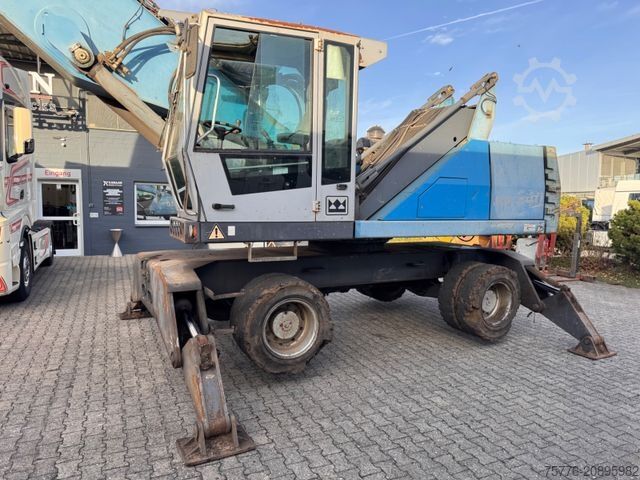 Hjulgraver FUCHS Terex MHL 340 Umschlagbagger Magnet