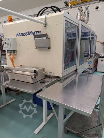 Enjeksiyon makinesi aksesuarlarıyla birlikte KraussMaffei KM 300-1400 C2