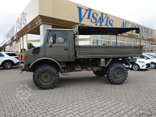 Vrachtauto met open laadbak MERCEDES-BENZ Unimog U 1300 L Turbo OM 366 Pritsche 4x4