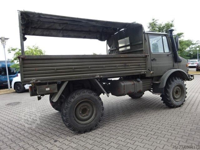 Vrachtauto met open laadbak MERCEDES-BENZ Unimog U 1300 L Turbo OM 366 Pritsche 4x4
