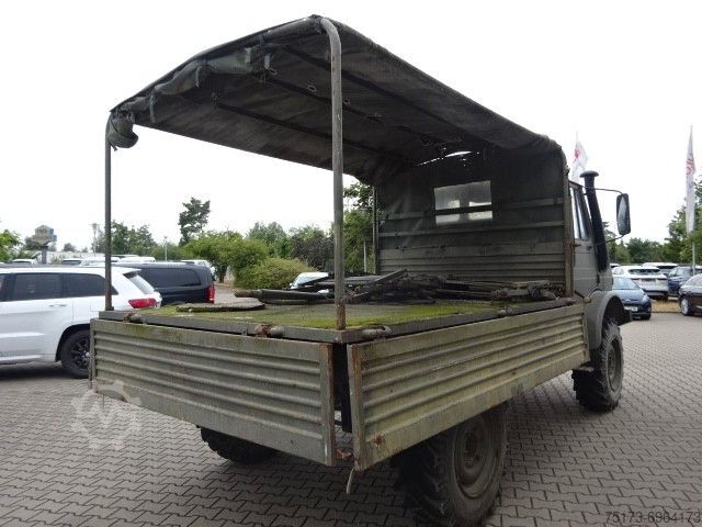 Vrachtauto met open laadbak MERCEDES-BENZ Unimog U 1300 L Turbo OM 366 Pritsche 4x4