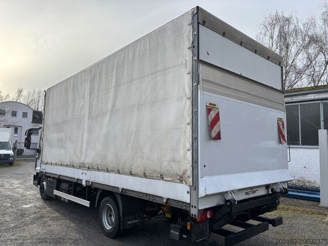 Truck with flatbed, tarpaulin cover, and tail lift Iveco EuroCargo 75-160 LBW