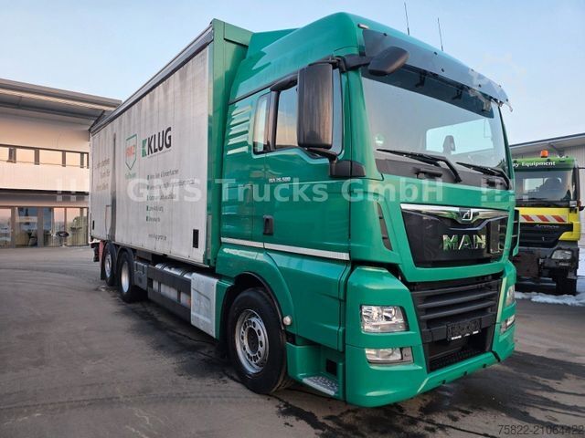 Flatbed truck with tarp MAN TGX 26.500 / Zug / Ret / Lenkachse / XL Zertifik