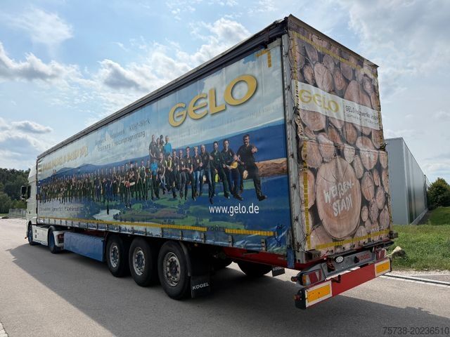Öppen semitrailer med kapell KÖGEL SN24 Pritsche+Schiebeplane/3-Achsen/Standard