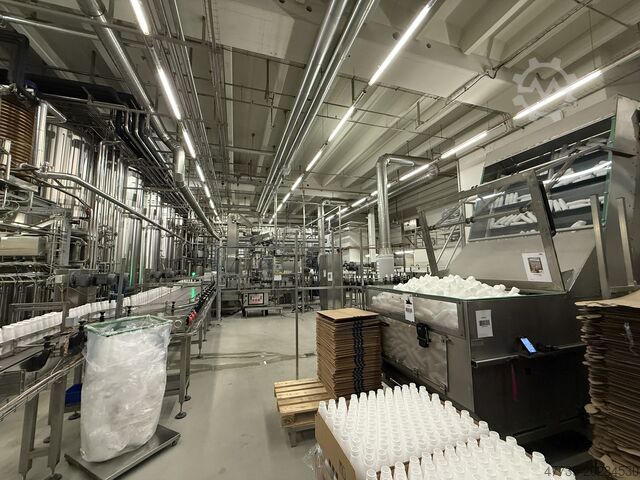 Machine voor het vullen van flessen AMPACK