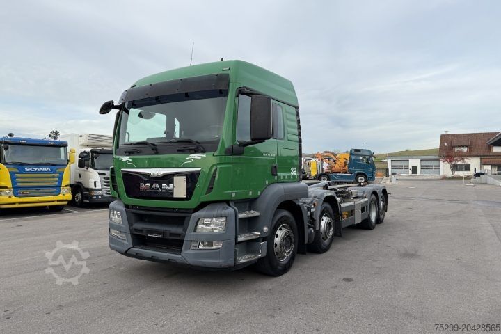 Kamion s kipom s pomičnim kontejnerom MAN TGS 35.440 8x2 Trösch / Swiss-Vehicle