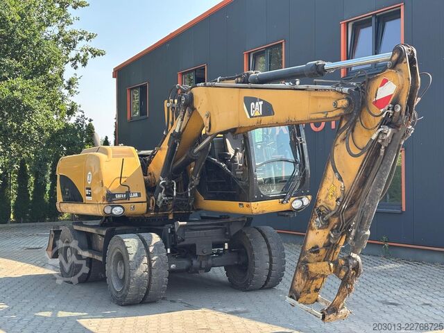 Koparka kołowa  CAT M313D