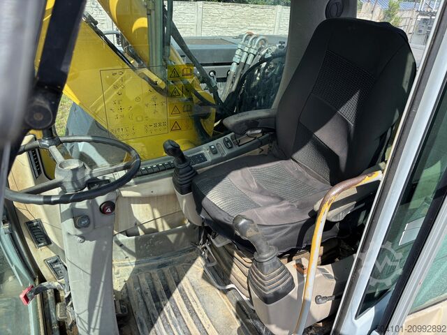 Gumikerekes kotrógép New Holland MH CITY