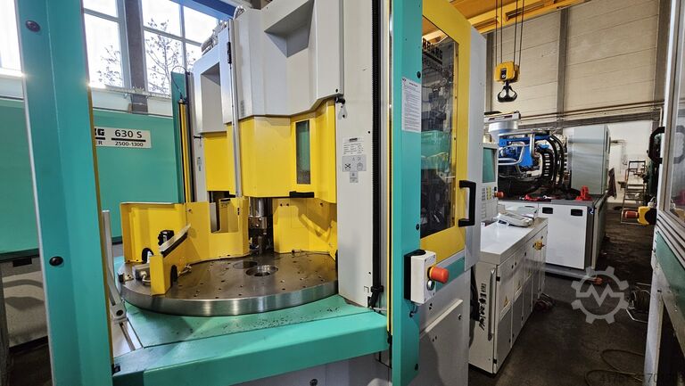 Függőleges fröccsöntőgép Arburg Allrounder 1200 T 1000-170