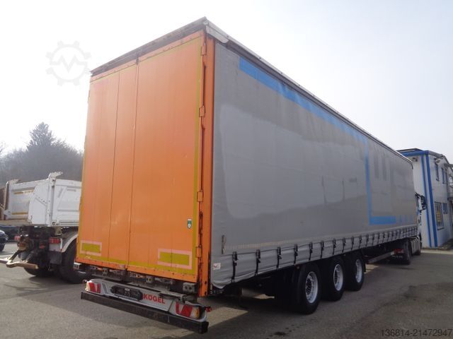 Semiremorcă deschisă cu prelată KÖGEL SN24 MEGA 435/50 R19,5 SAF
