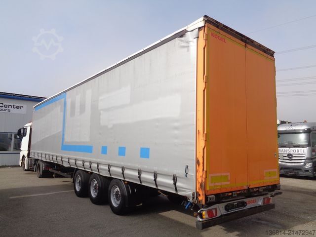 Semiremorcă deschisă cu prelată KÖGEL SN24 MEGA 435/50 R19,5 SAF