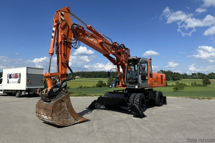 Kettinggraafmachine Hitachi ZX210W Lehnhoff Schnellwechsler / Swiss-Vehicle