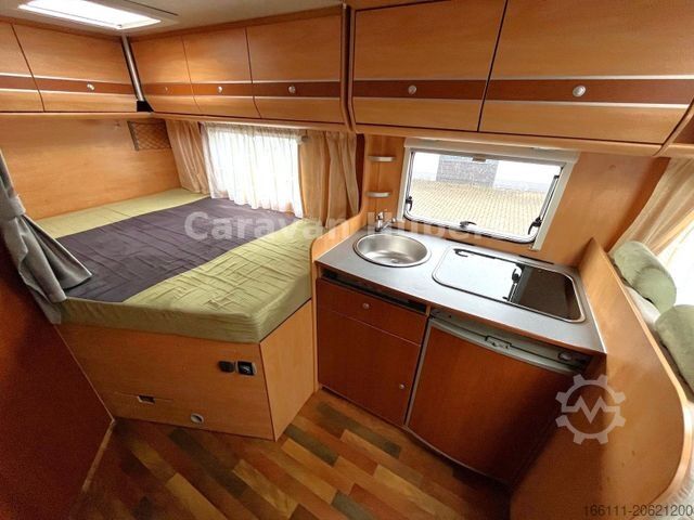 Polointegrovaný obytný vůz GLUECKSMOBIL T 345 - Festbett - Klima - Sat/TV - Solar -