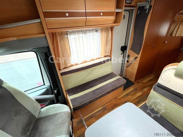 Polointegrovaný obytný vůz GLUECKSMOBIL T 345 - Festbett - Klima - Sat/TV - Solar -