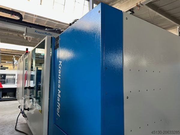 Spuitgietmachine KraussMaffei KM 200-750 CX mit dem Roboter Wittmann-K