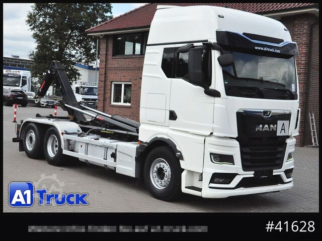 Abrollkipper MAN TGX 26,500 LL, HIAB Intarder Navi Sound, Funk