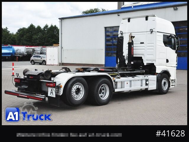 Abrollkipper MAN TGX 26,500 LL, HIAB Intarder Navi Sound, Funk
