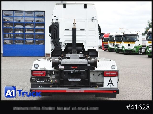 Abrollkipper MAN TGX 26,500 LL, HIAB Intarder Navi Sound, Funk