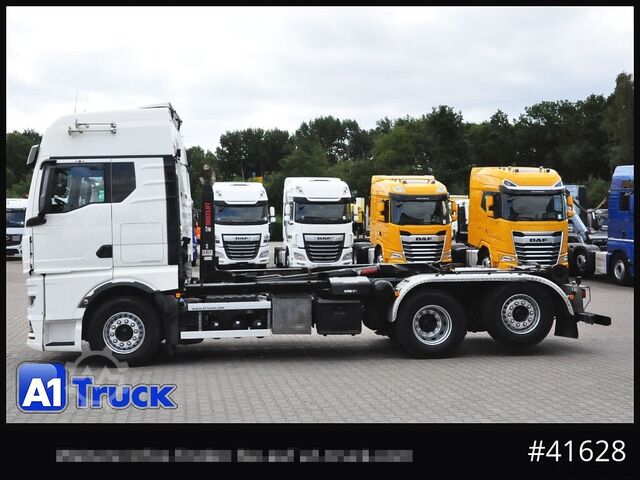 Abrollkipper MAN TGX 26,500 LL, HIAB Intarder Navi Sound, Funk