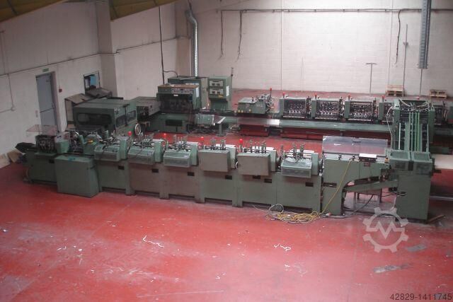 Saddle stitcher with feeder and cutting 