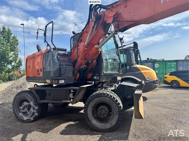 Tekerlekli ekskavatör Hitachi ZX140W-5B Wheeled excavator w/ Rototilt and 2 buck