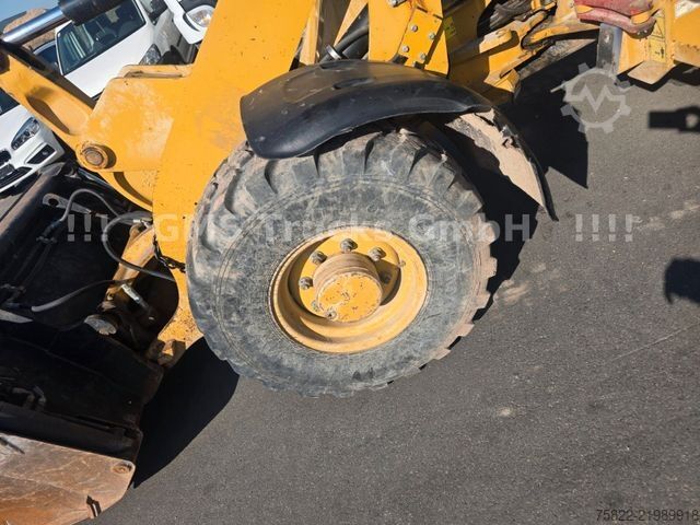 Kerekes rakodó CATERPILLAR 907 H / SW + Schaufel / Motorschaden