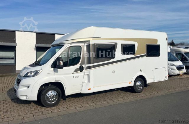 Half-integraal camper CARADO T 348 - Hub/Festbett - Klima - Garage -