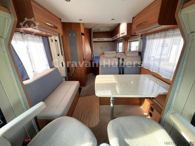 Half-integraal camper CARADO T 348 - Hub/Festbett - Klima - Garage -