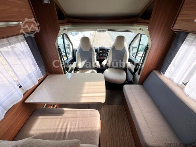 Half-integraal camper CARADO T 348 - Hub/Festbett - Klima - Garage -