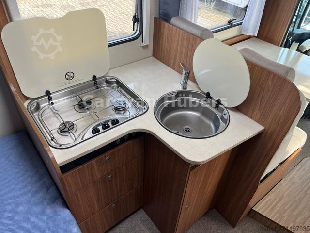 Half-integraal camper CARADO T 348 - Hub/Festbett - Klima - Garage -